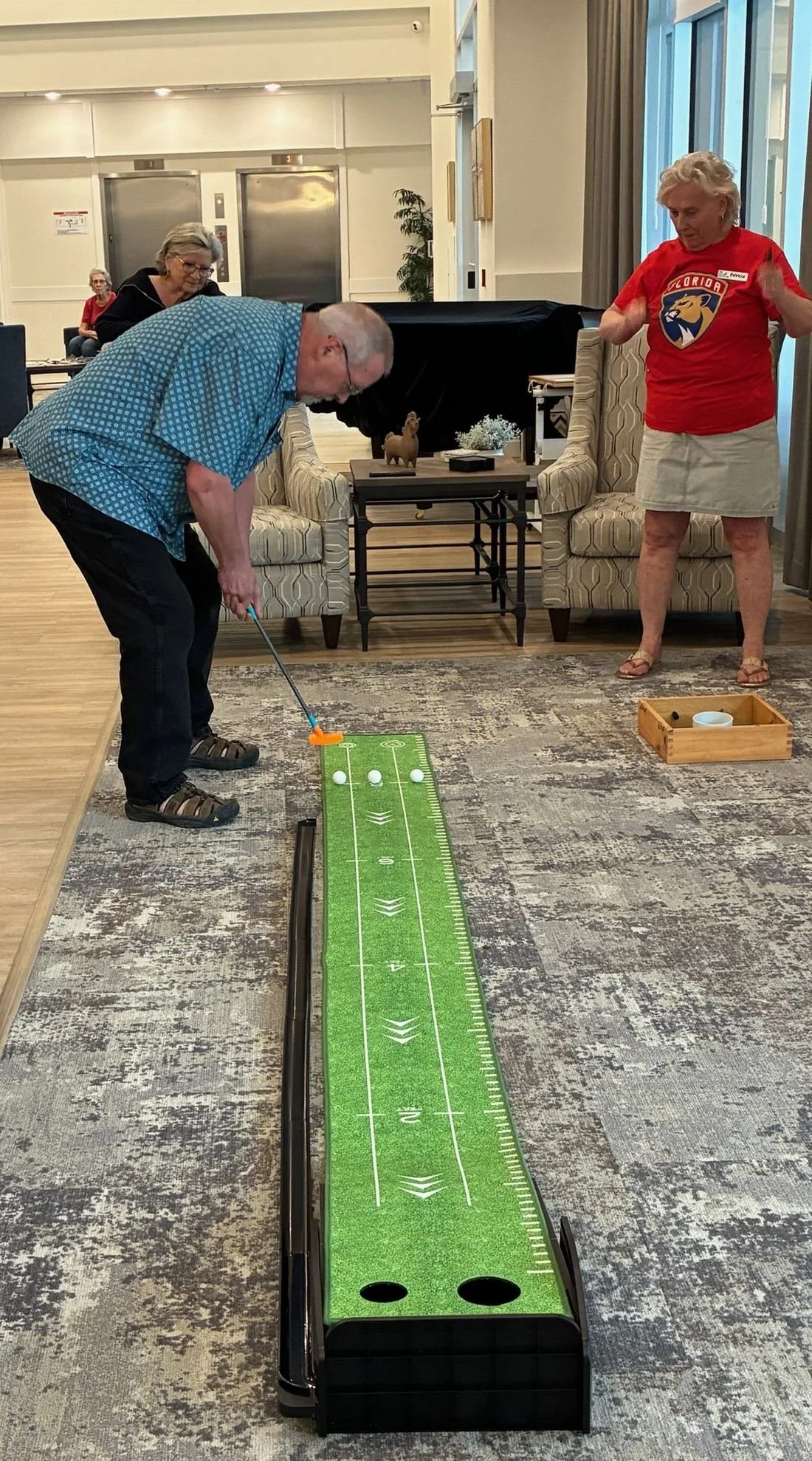Putting game in the games room at Three Robins