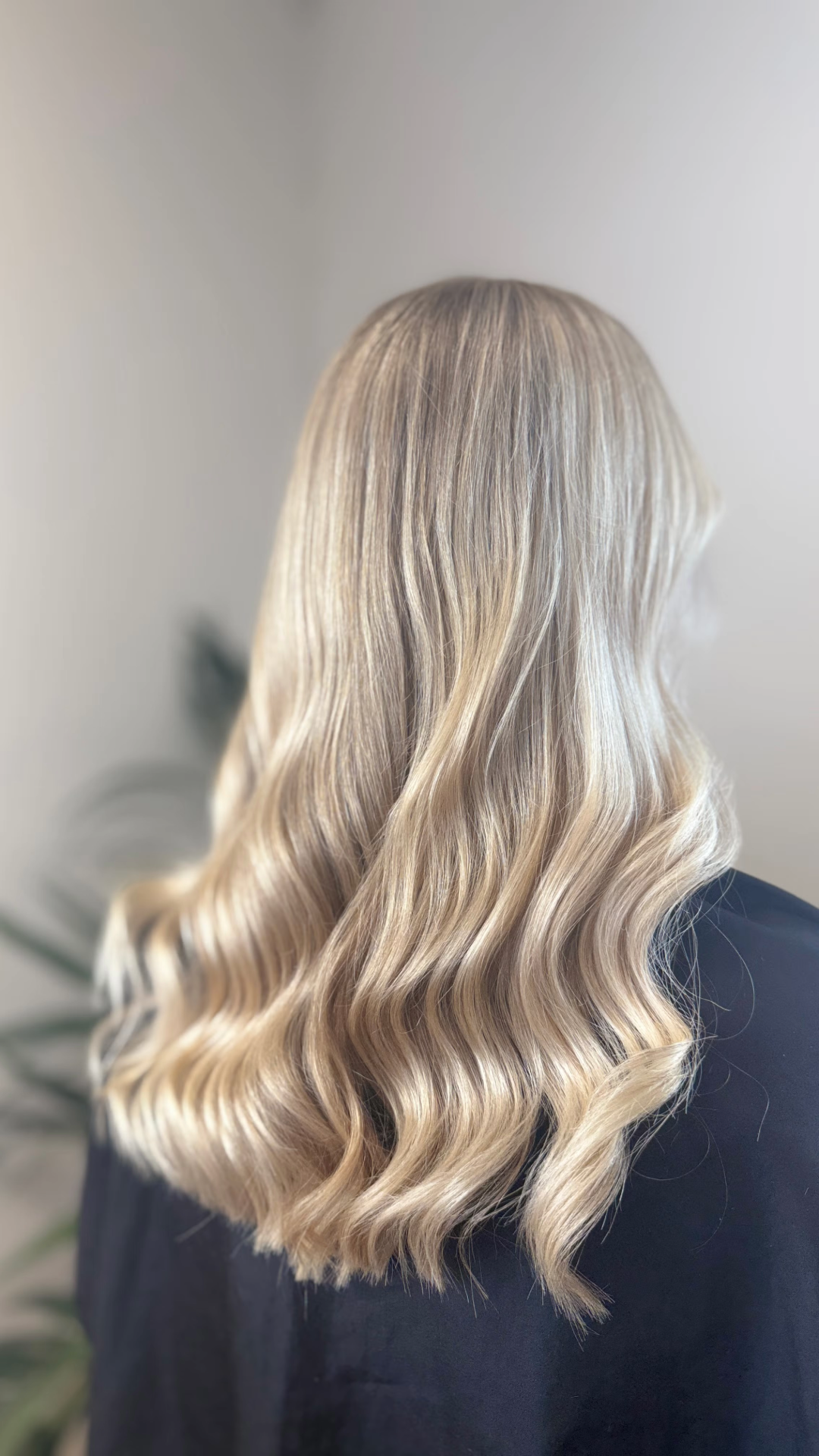 Close-up of bright, multi-tonal blonde waves
