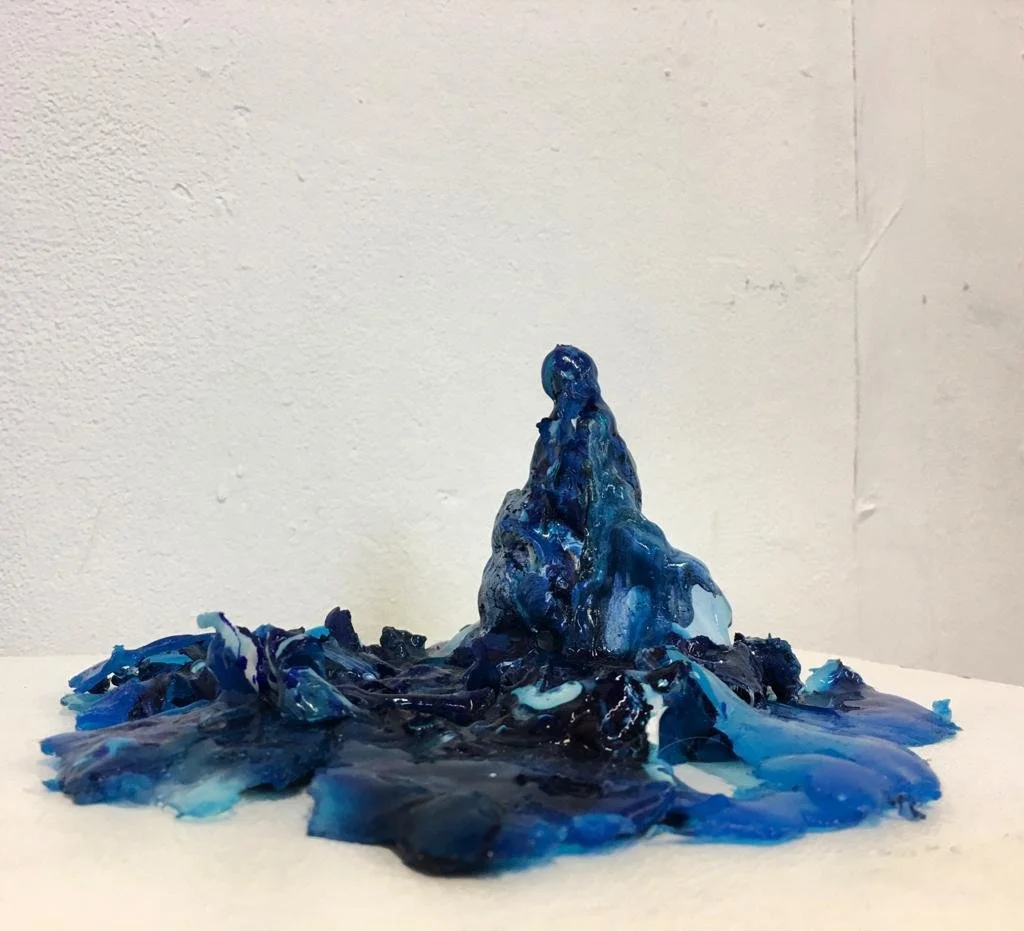 Mavi Lava by Su Taşkın, a glossy blue sculptural form spreading across its base