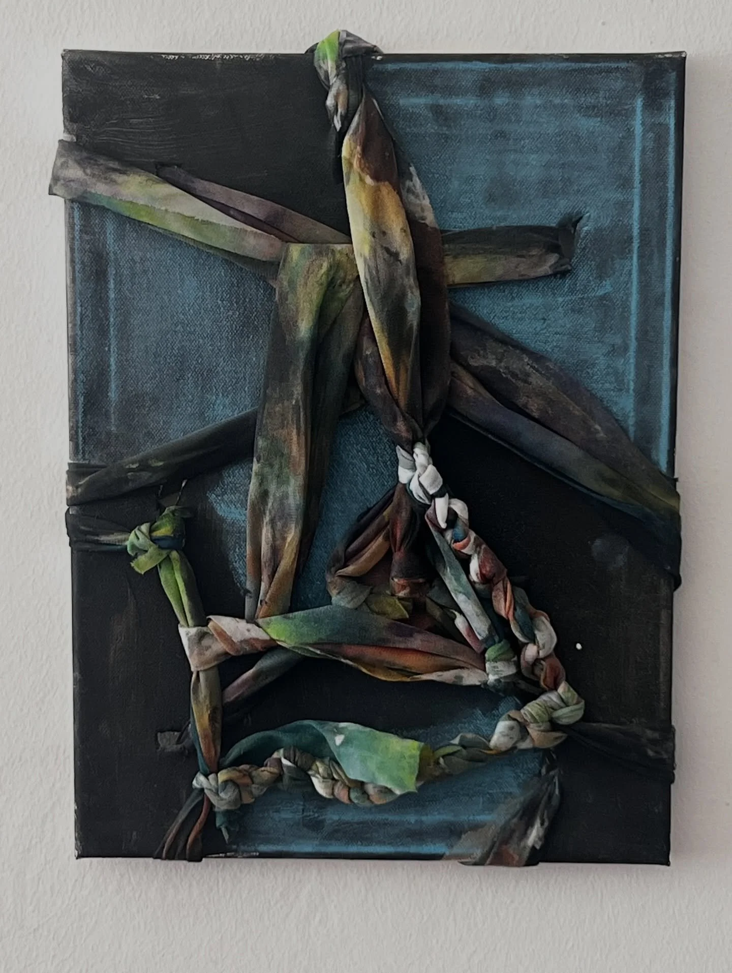Passing Through by Su Taşkın, woven and knotted fabric over a blue painted canvas