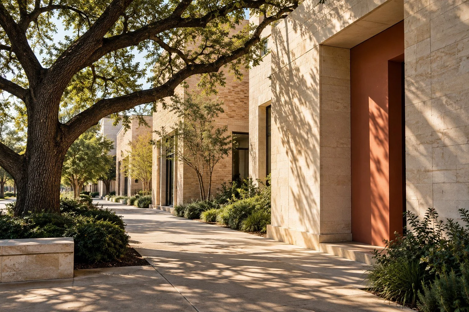 Illustrative North Texas architecture with limestone walls, a coral doorway and live-oak shadows.
