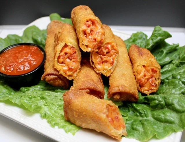 Pepperoni Pizza Roll, cut open to show the filling
