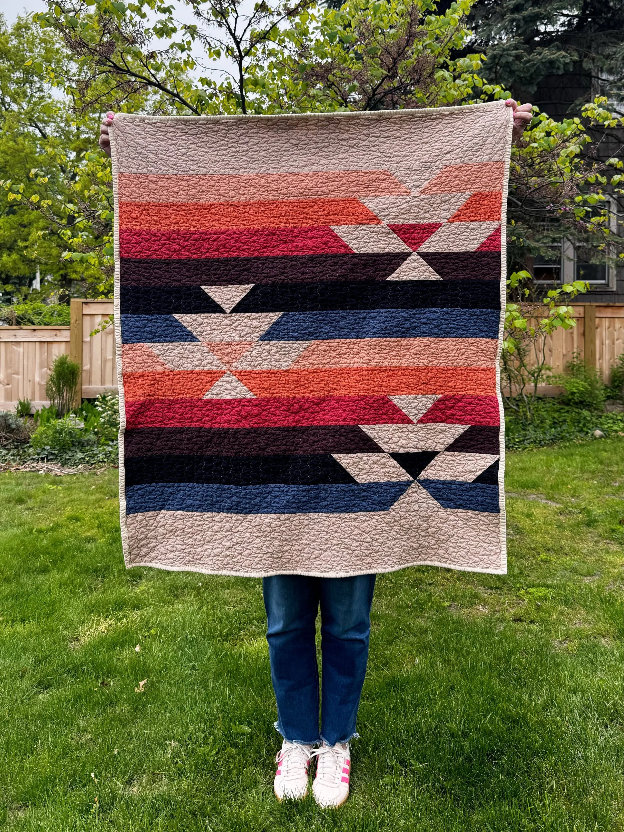 This quilt has been safely delivered to its new home, so I can safely show it to you! This was a special project for me, going to a beloved cousin and her new baby. 

Wovens have been my new favorite go-to for a bespoke baby quilt. The colors and the