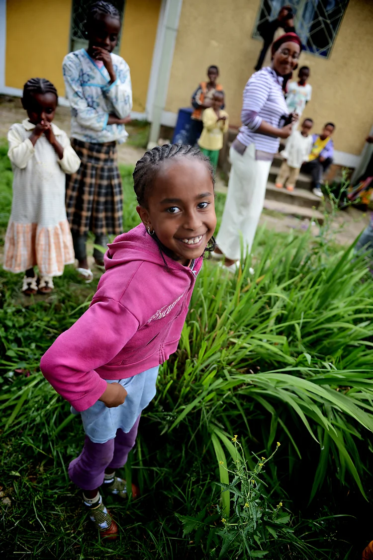 This little girl at Mary Joy tried to teach me to dance -- and when I tried to do the shoulder-popping moves that she was doing, I think she felt sorry for me, because she didn't leave my side the rest of the visit. I seriously fell in love with her.
