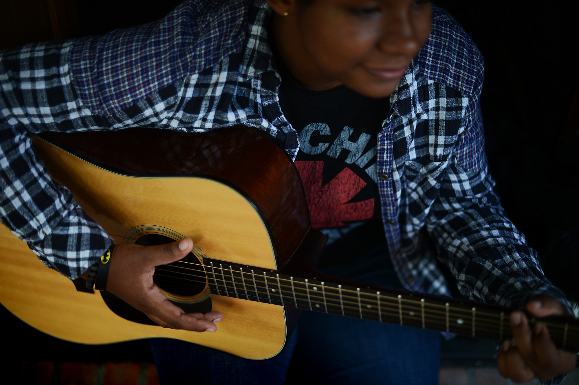 Alex practicing her guitar at home. Monday, July 3rd, 2017.