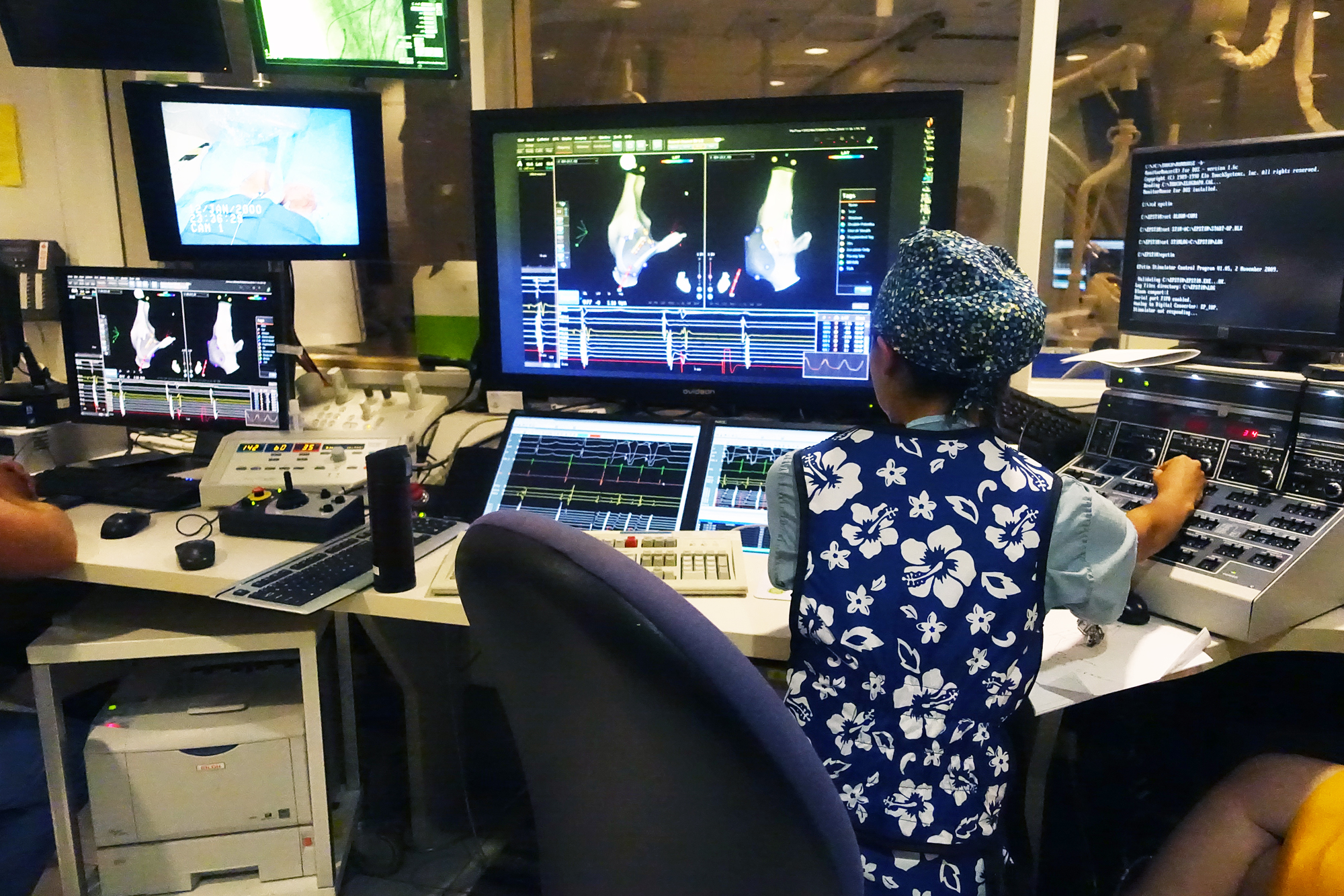 A physician at Texas Children's Hospital performs heart surgery on a 3-year-old patient, using computers and a joystick (!), August 2014.