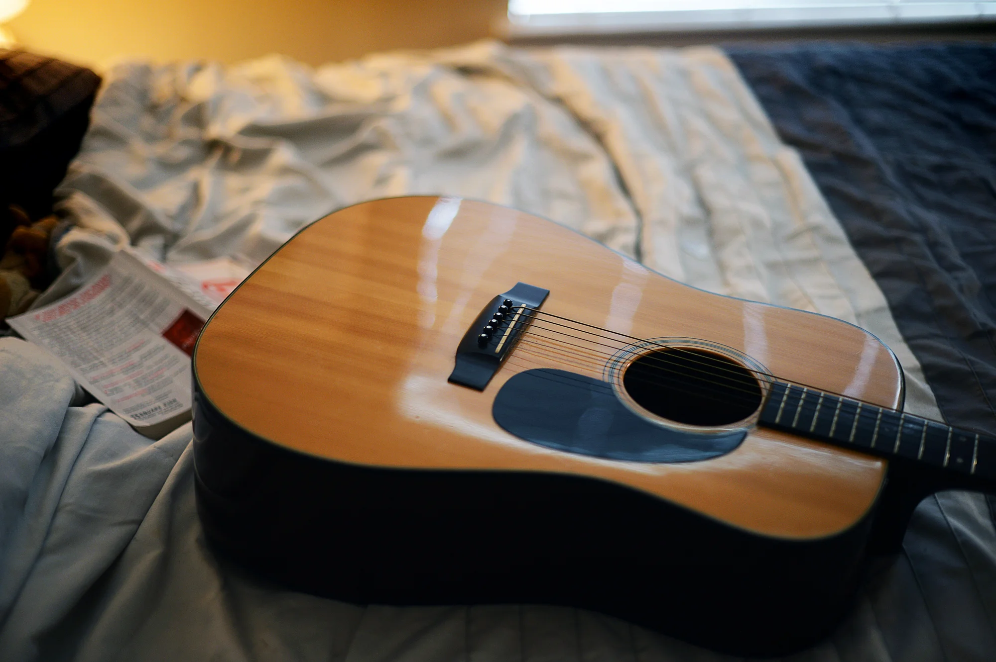 Alex's guitar (that used to be my guitar, when I was 12 years old). This was the first item we saved from the flood -- it came with us as soon as we waded out of the house.