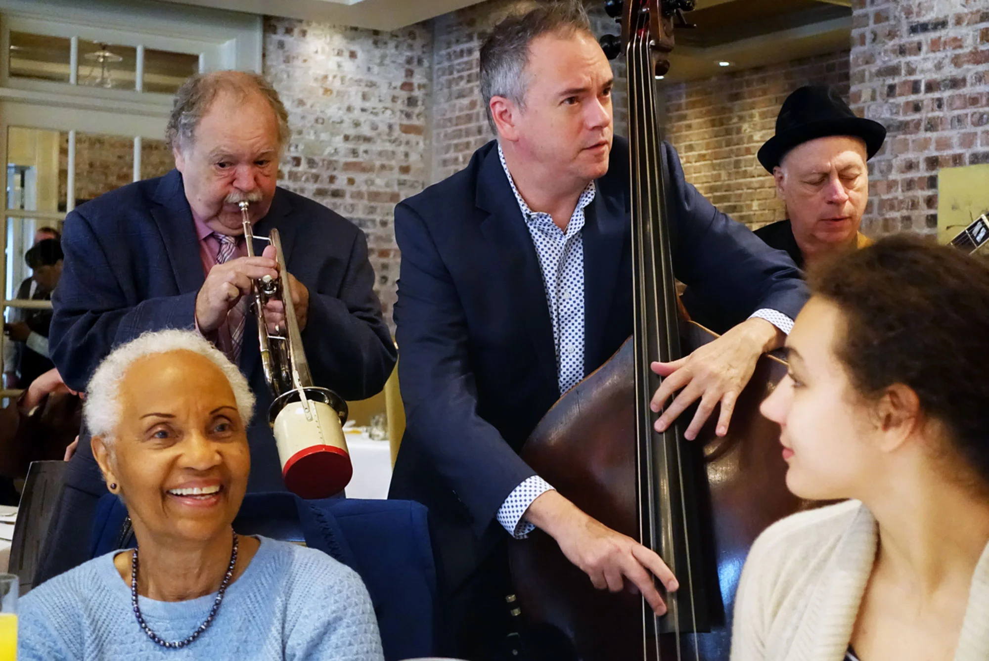 Because it’s not really a New Orleans restaurant until a jazz band serenades you.
