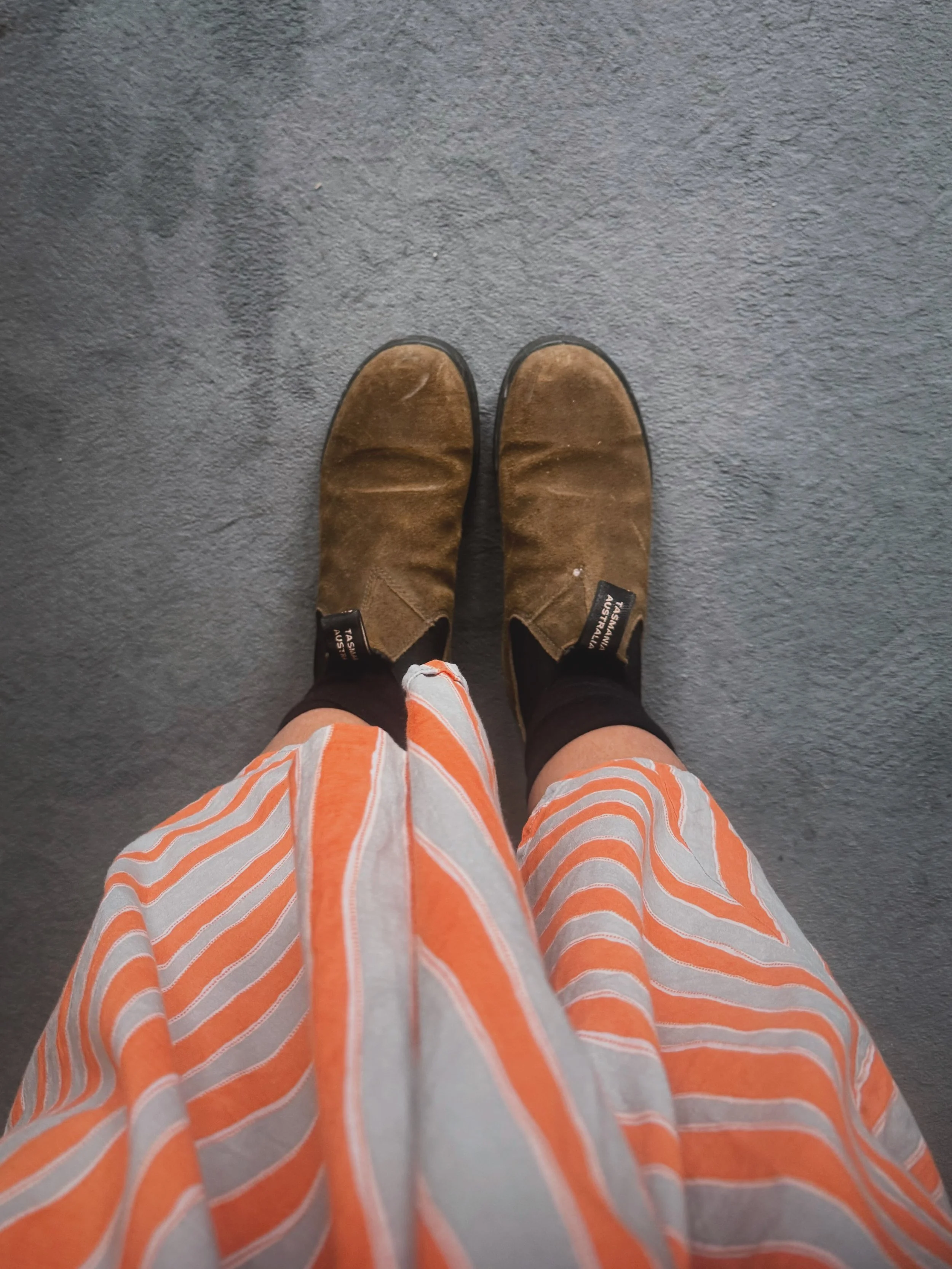 Dispatch from the UK:

We&rsquo;re off to visit my father-in-law today. I&rsquo;m always too warm in English houses, so I wanted to wear something cool, but it&rsquo;s also raining (hallelujah!), so I wanted to wear waterproof boots.

Me: &ldquo;Does