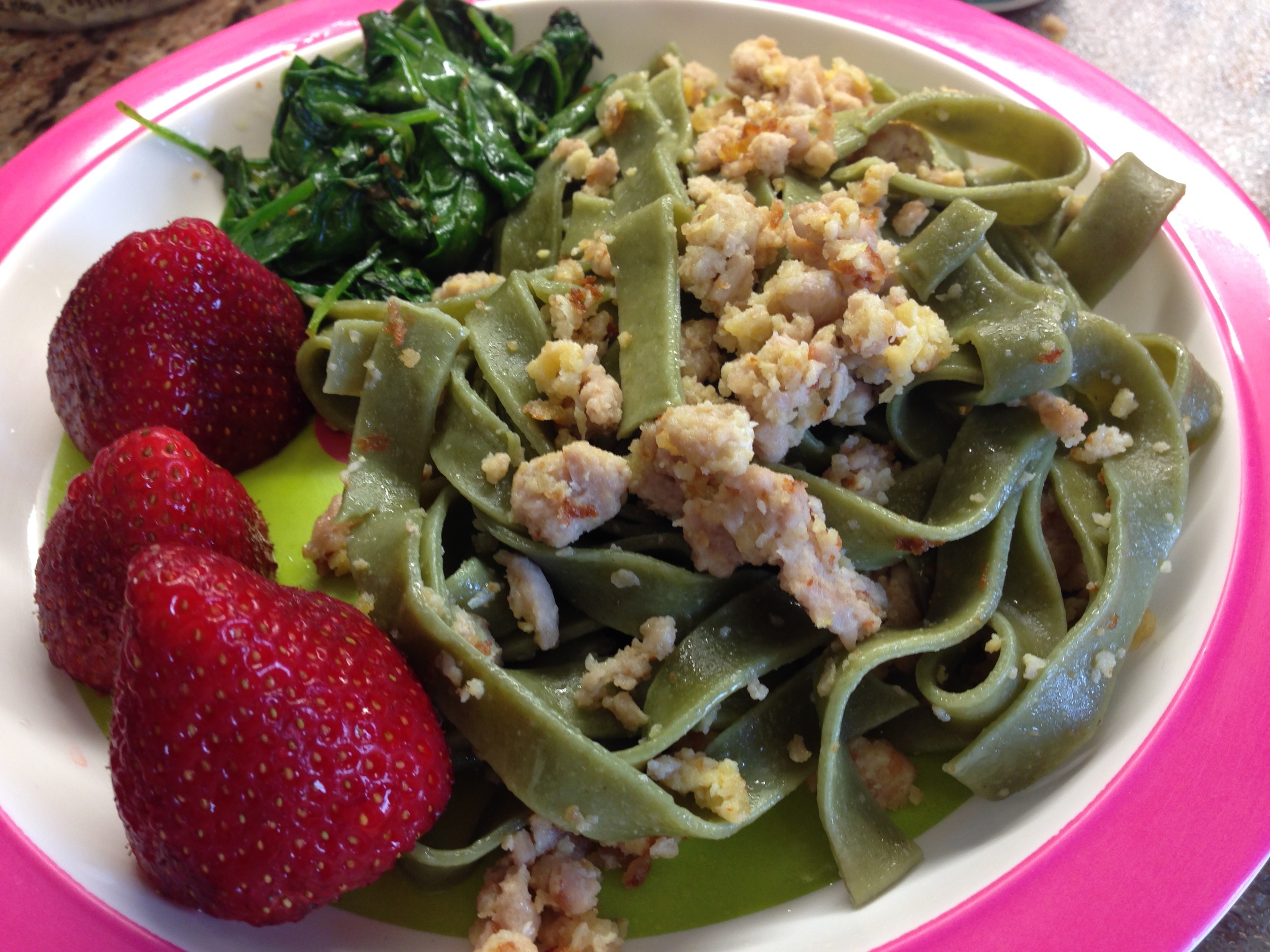 Spinach linguine with deconstructed meatballs, sautéed spinach and strawberries. A really fast dinner! 