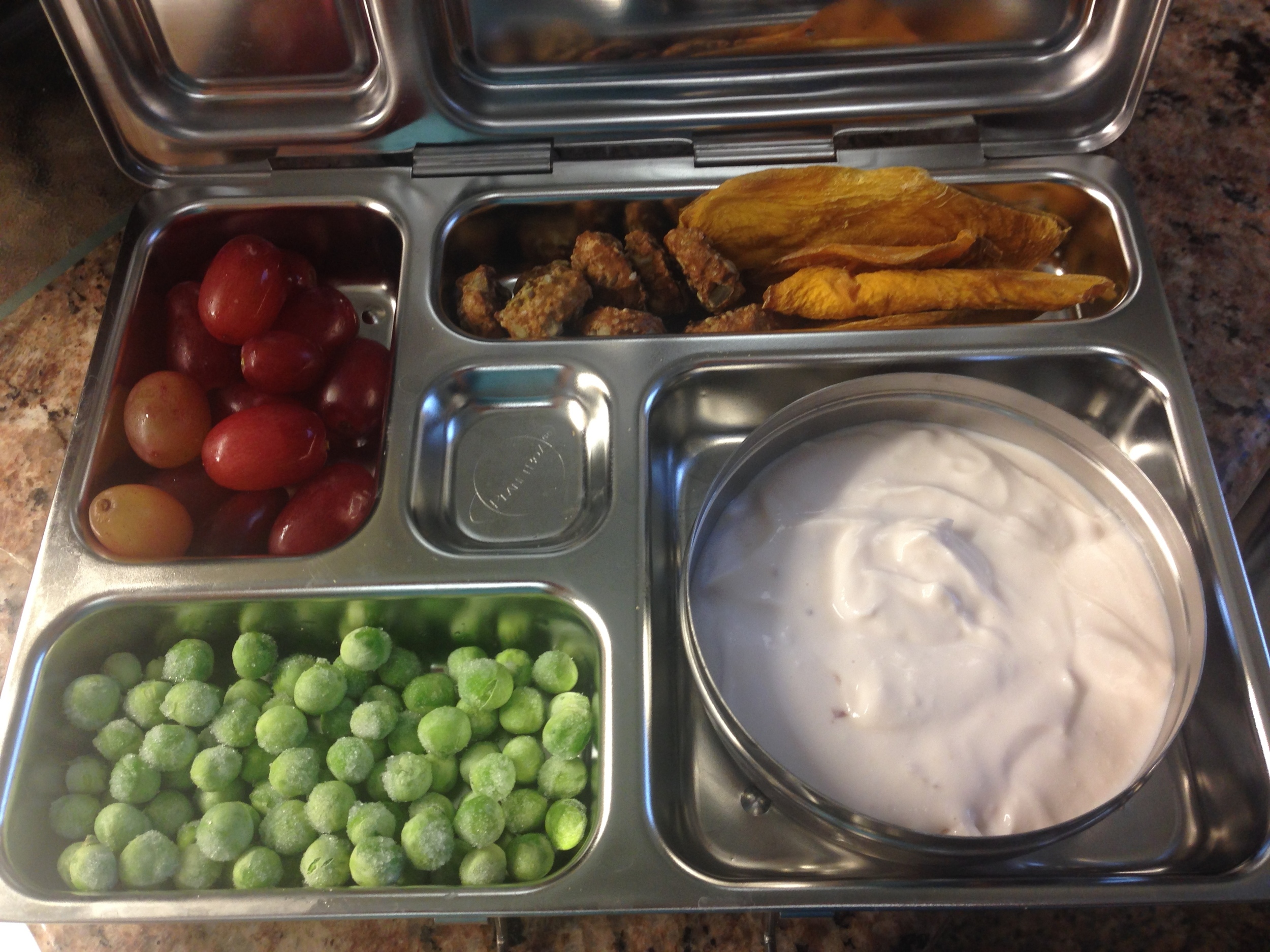 Cherry yogurt, frozen peas, grapes, dried mango, Somersault Snacks Pacific Sea Salt cookies