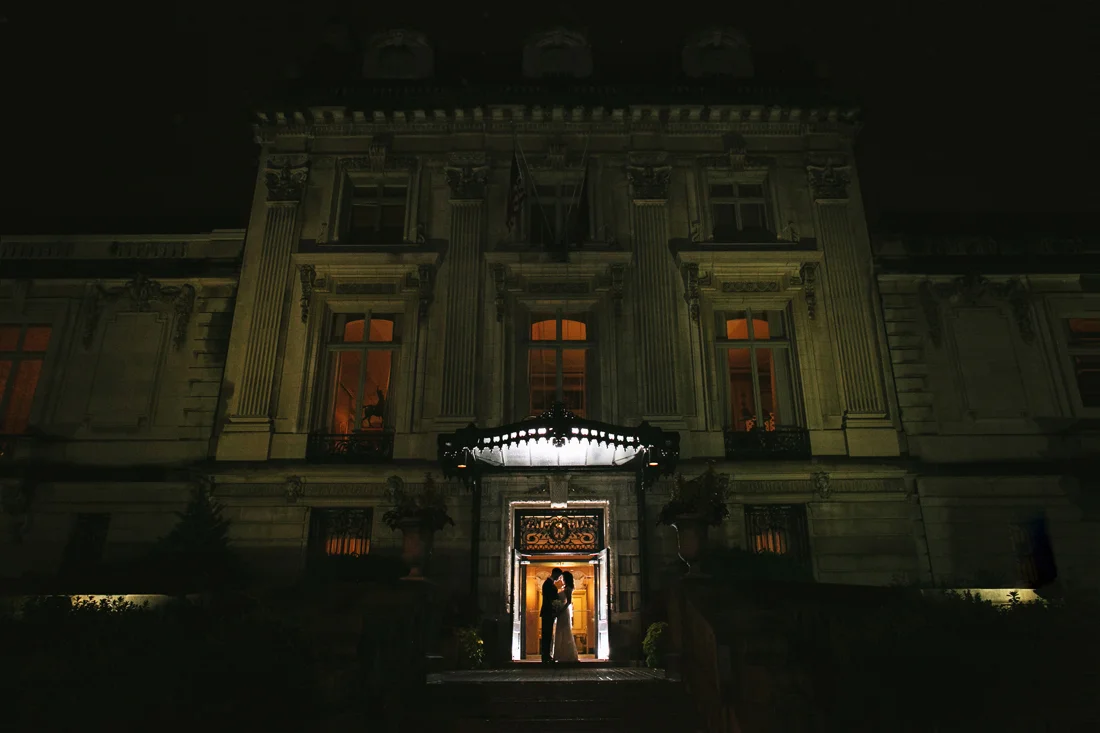 Silhouette night photo of bride & groom at the Cosmos Club in DC - Maria Vicencio Photography Weddings