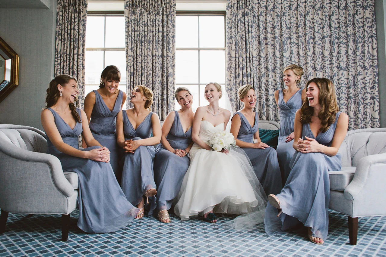 Bride and bridesmaids laughing at St. Regis Hotel in Washington, DC - Maria Vicencio Photography Weddings