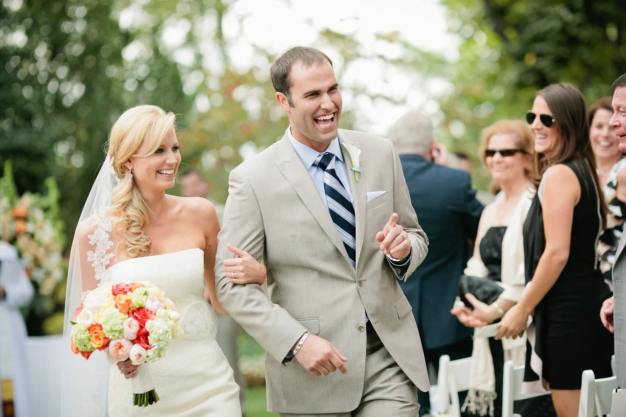 Happy bride and groom walking down aisle after ceremony at the Meridian House in DC - Maria Vicencio Photography Weddings