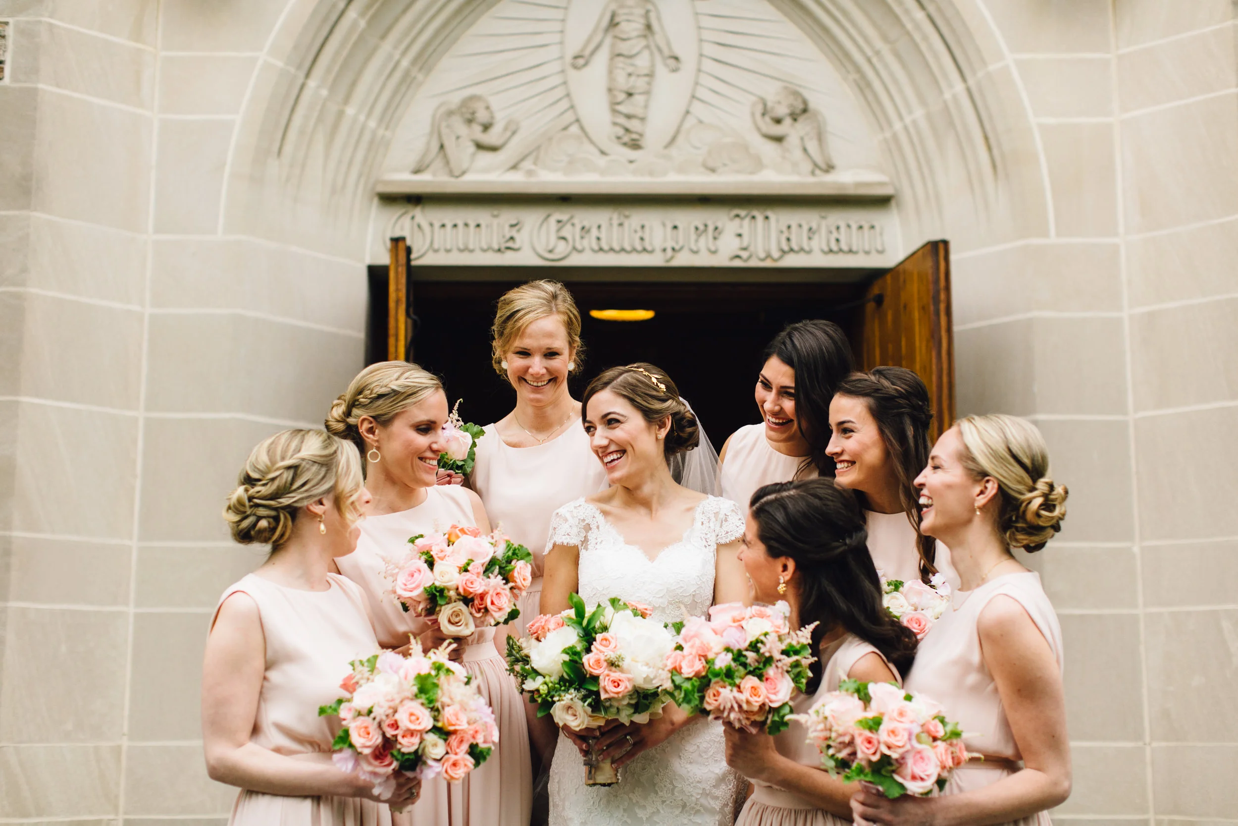 Bride and bridemaids on steps of Loyola University Maryland Chapel in Baltimore, MD - Maria Vicencio Photography Weddings
