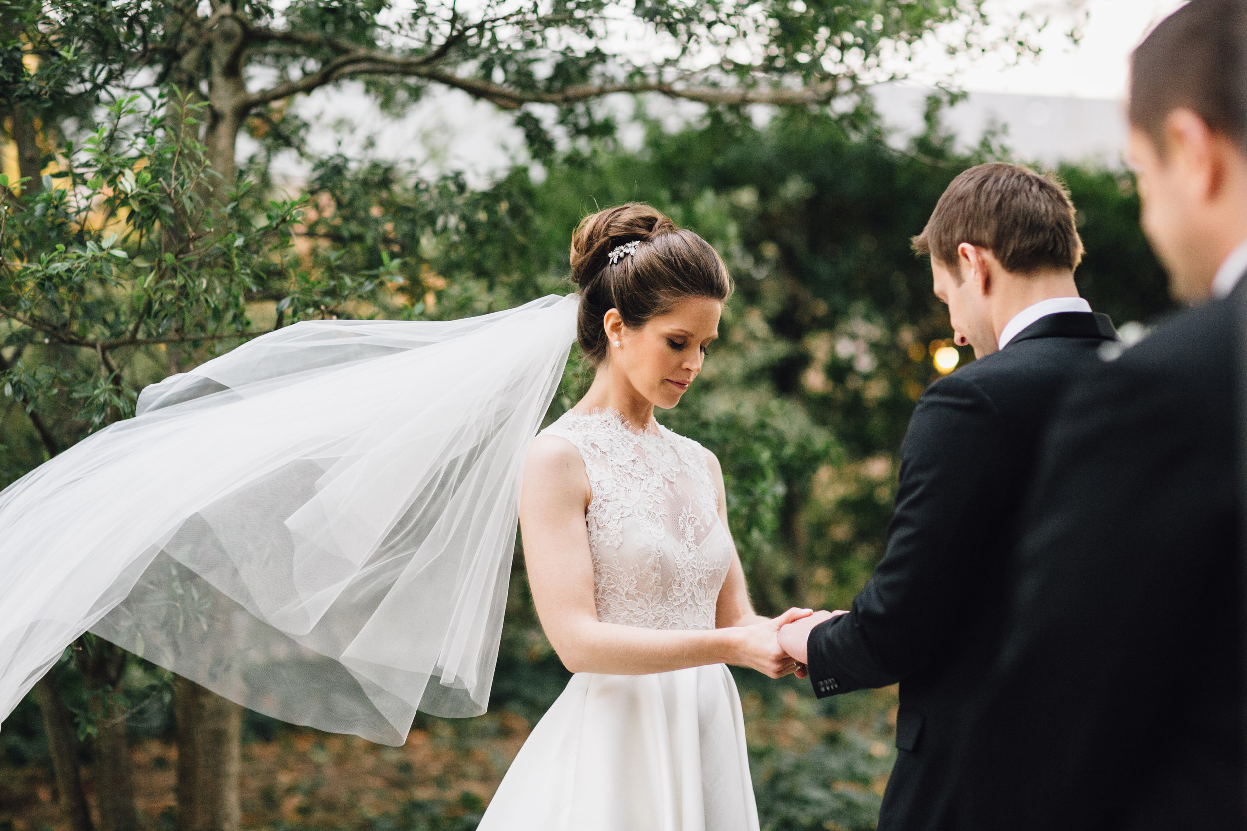 Bride during ceremony with veil blowing in the wind at Meridian House in DC - Maria Vicencio Photography Weddings