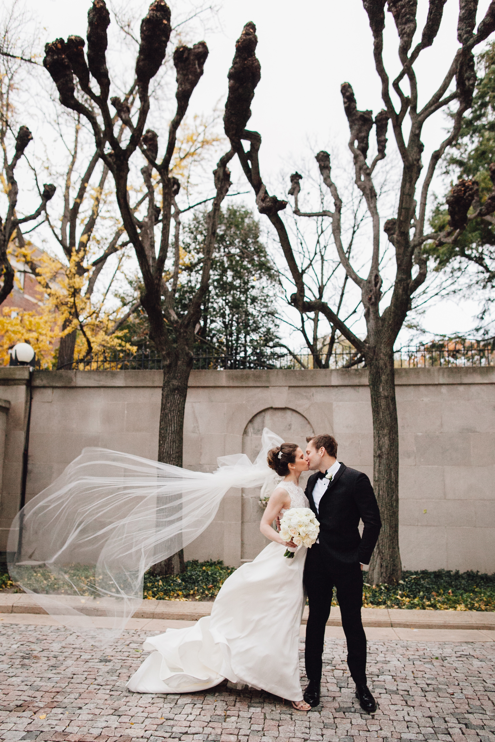 Windy portrait of the bride and groom at Meridian House in DC - Maria Vicencio Photography Weddings