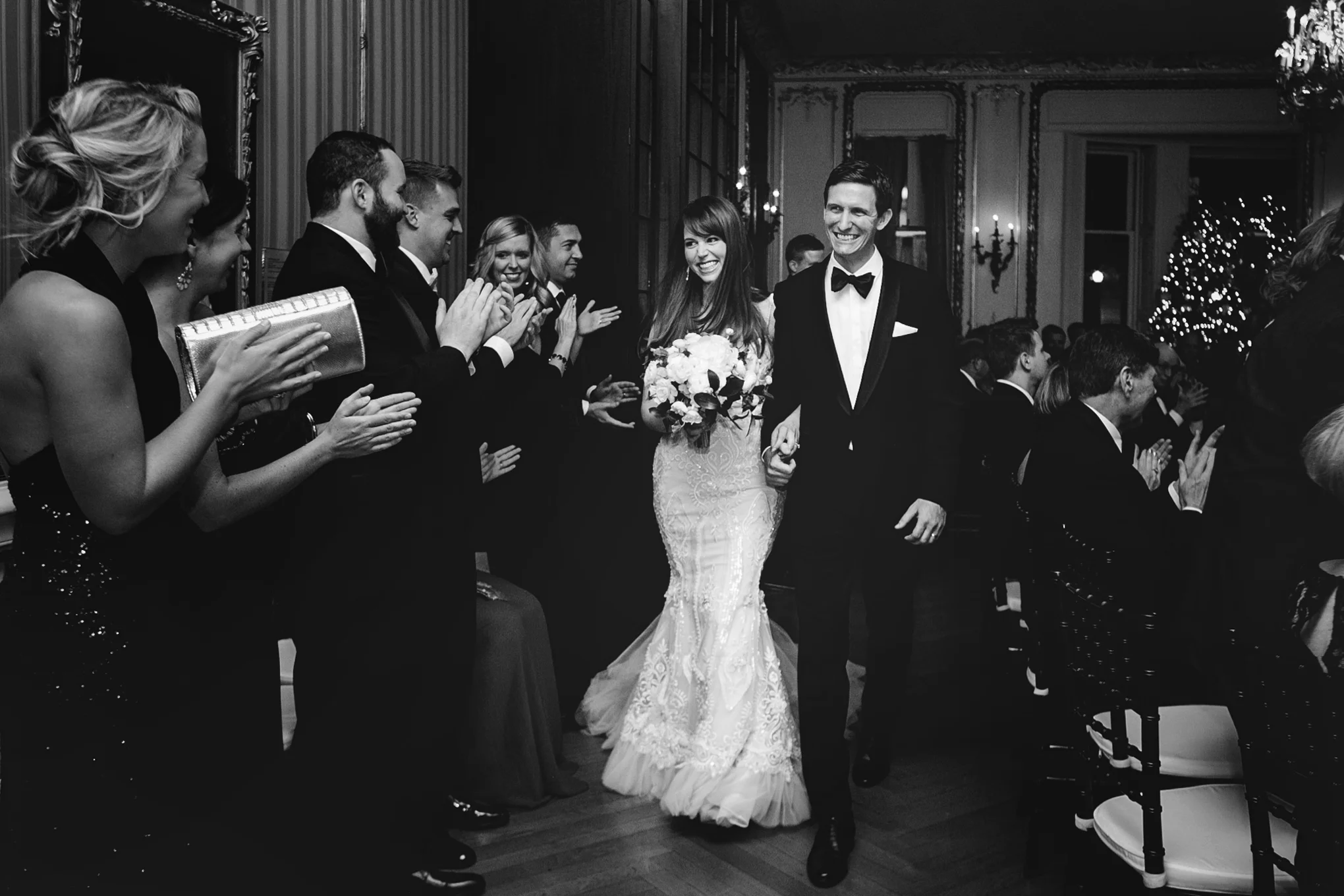 Black and white shot of smiling bride and groom after ceremony at the Engineer's Club in Baltimore - Maria Vicencio Photography Weddings
