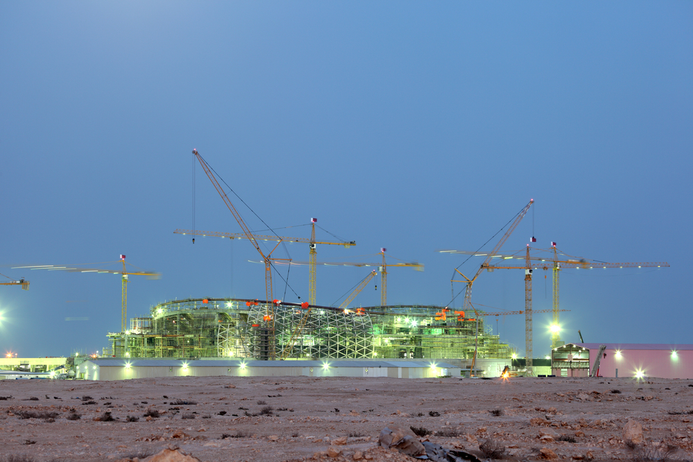 Construction of a new stadium near Lusail in the desert of Qatar. December 16 2013 in Lusail, Qatar.&nbsp;Philip Lange / Shutterstock.com