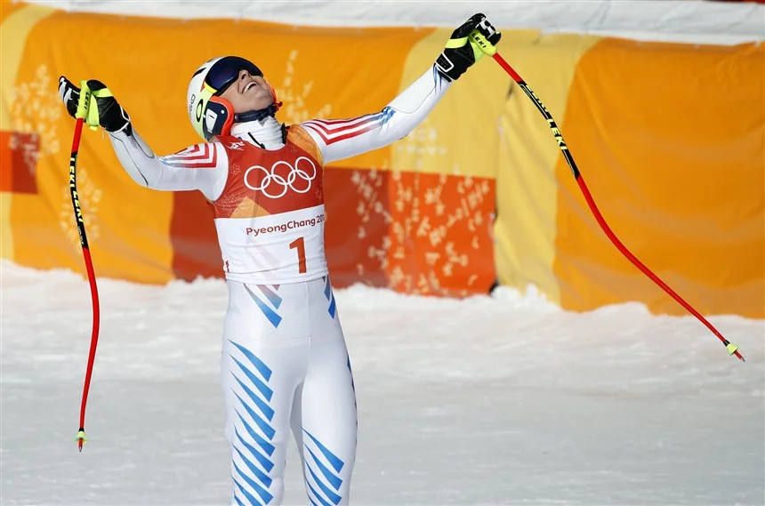 An emotional moment following the women's super-G at the 2018 Winter Olympics on Feb. 17, 2018. Christophe Ena / AP