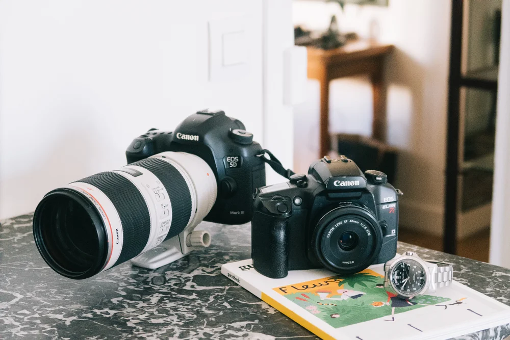 Canon 5D mkIII, 70-200mm f/2.8 IS, Canon Elan 7n, 40mm f/2.8 pancake, Hamilton King Khaki II
