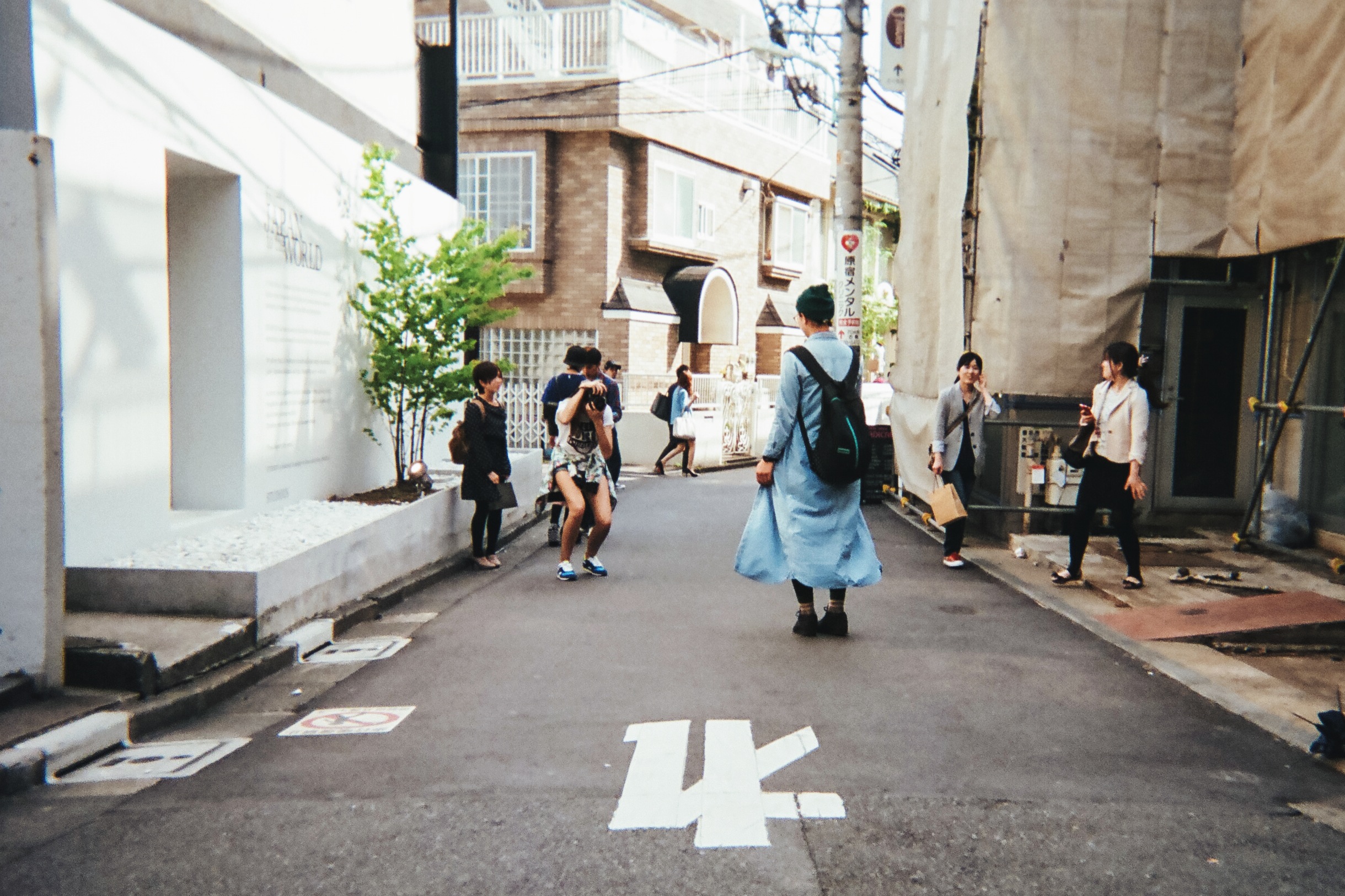 Ania B on the job, capturing Tokyo style