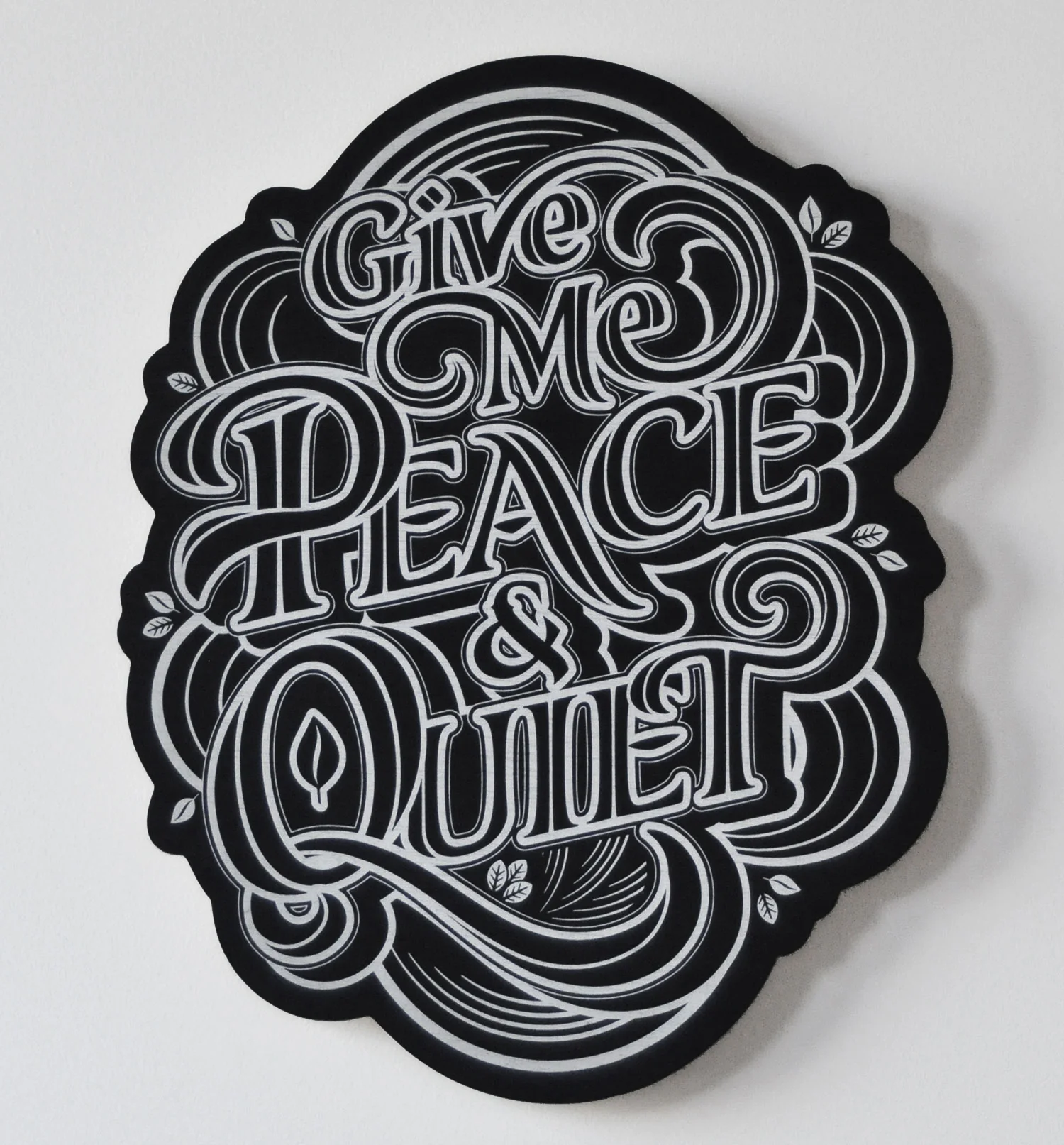 Machine cut and stained birch ply. 17"x21"