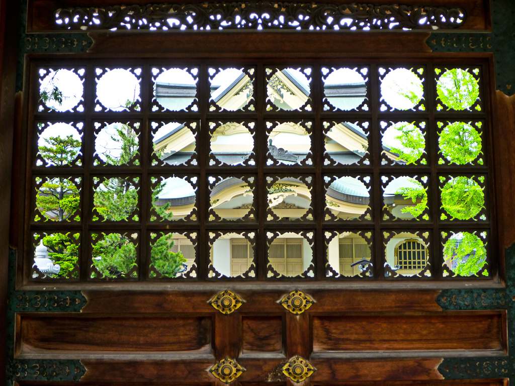 The Temple through a screen in one of the doors