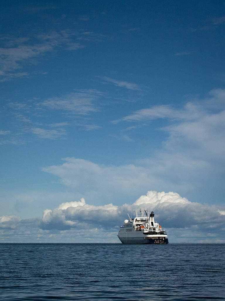 Orion anchored off Arguni