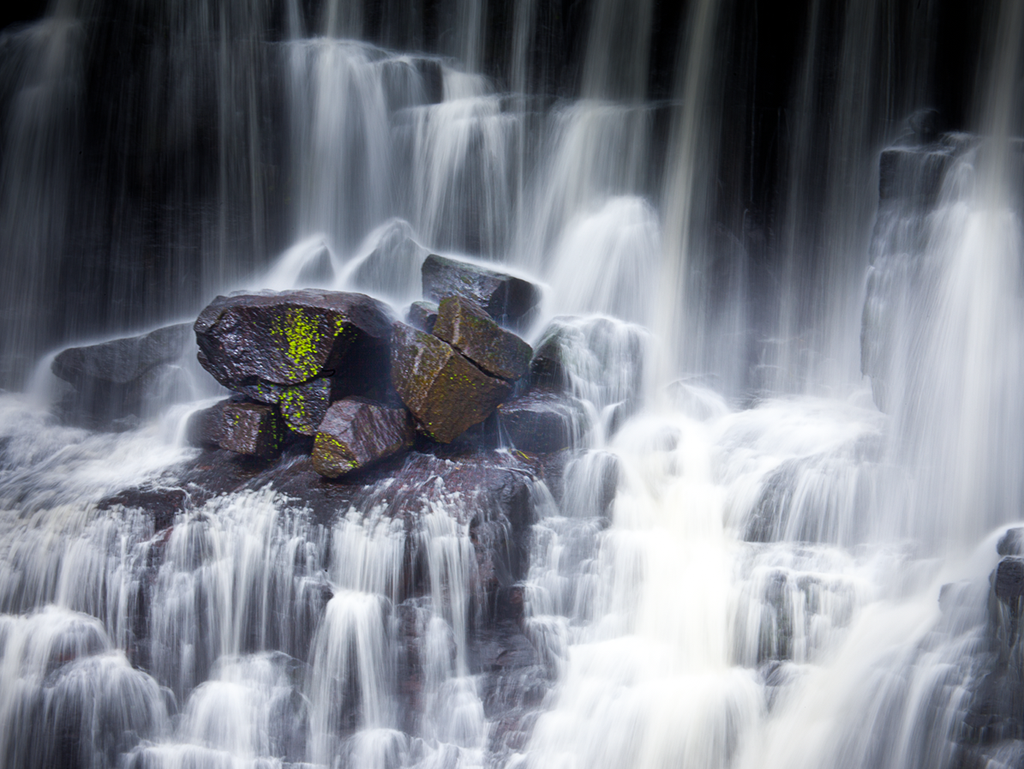 Water cascading over the rocks at Ebor Upper Falls.