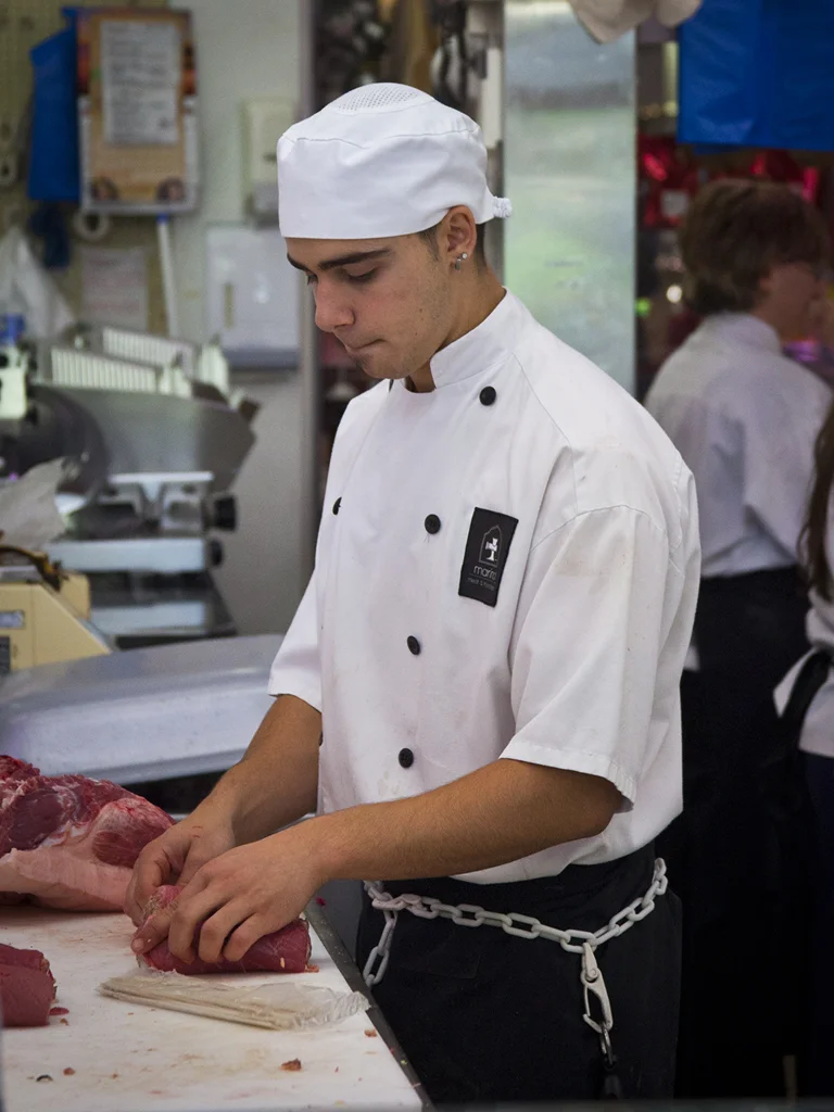 Ricardo hard at work - Stall GO52-54 "Marino Meats"