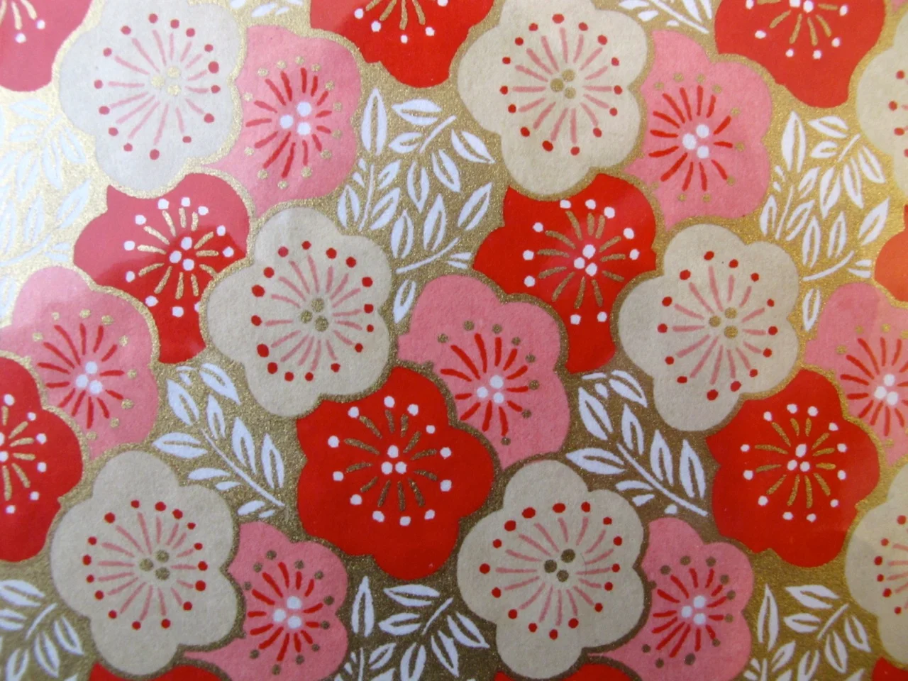 Plum blossoms on chiyogami paper.