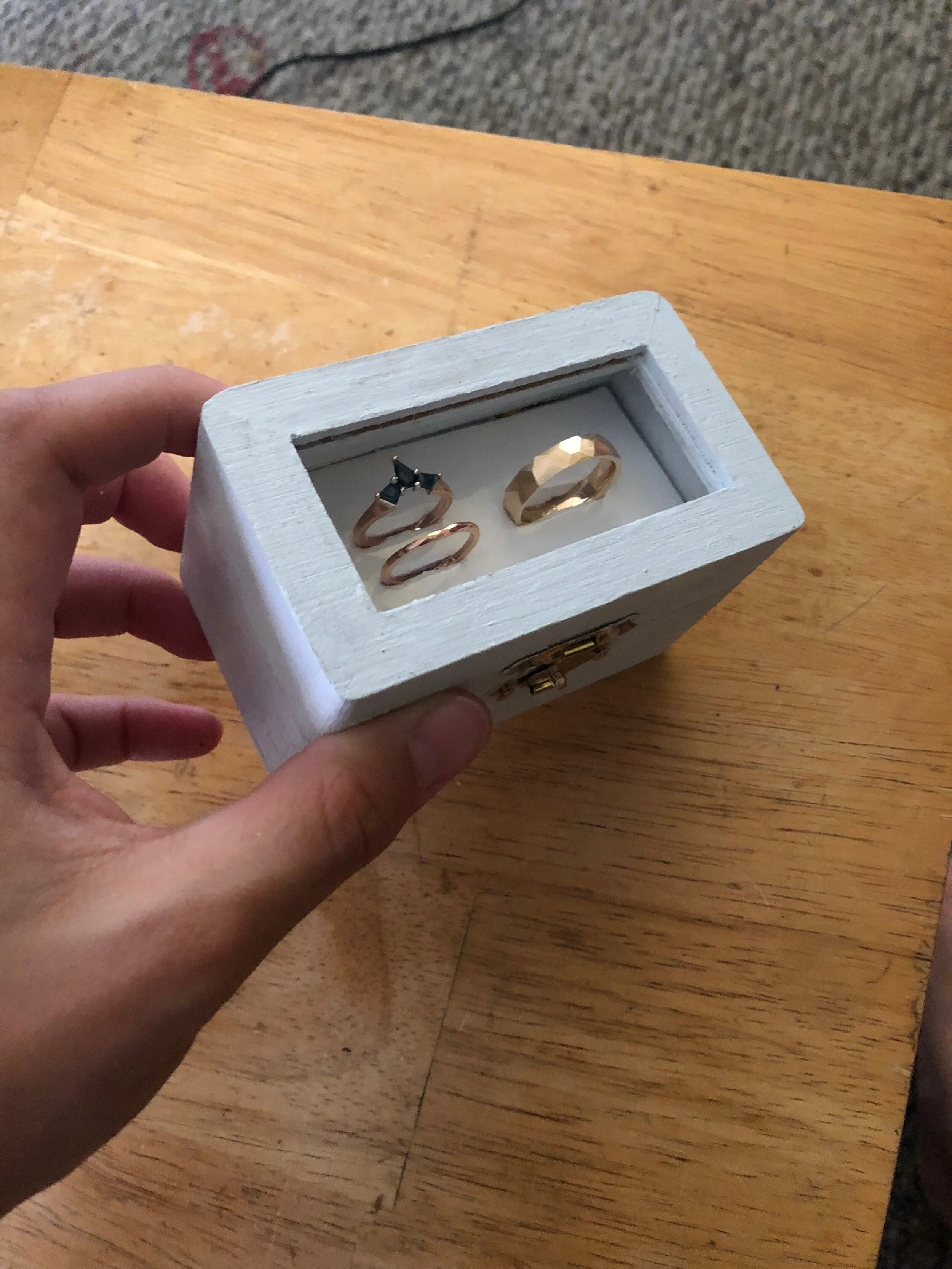  A box altered (take out the top &amp; add glossy ledge to hold the rings)  to hand our rings around during the ceremony for guests to give us their best wishes - Thank you Tara for the inspiration. 