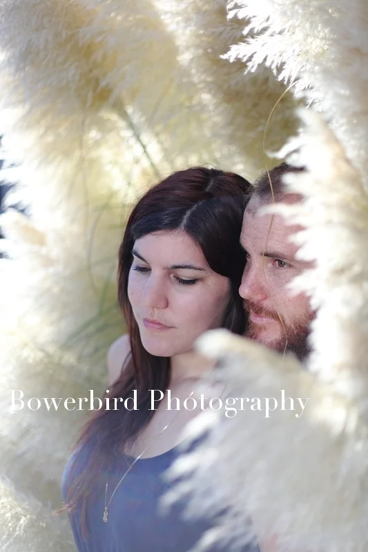 Feather romance! © Bowerbird Photography 2012; Engagement Photography at the Panhandle, San Francisco.
