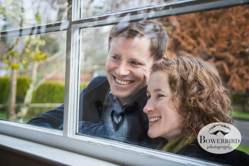 Peeking in the window of their new beautiful home! © Bowerbird Photography 2012; Couple's Photography in Seattle.