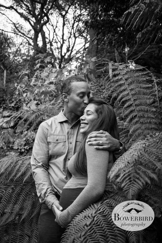 A kiss in the ferns. © Bowerbird Photography 2013; Maternity Photography at Lake Temescal, Oakland.