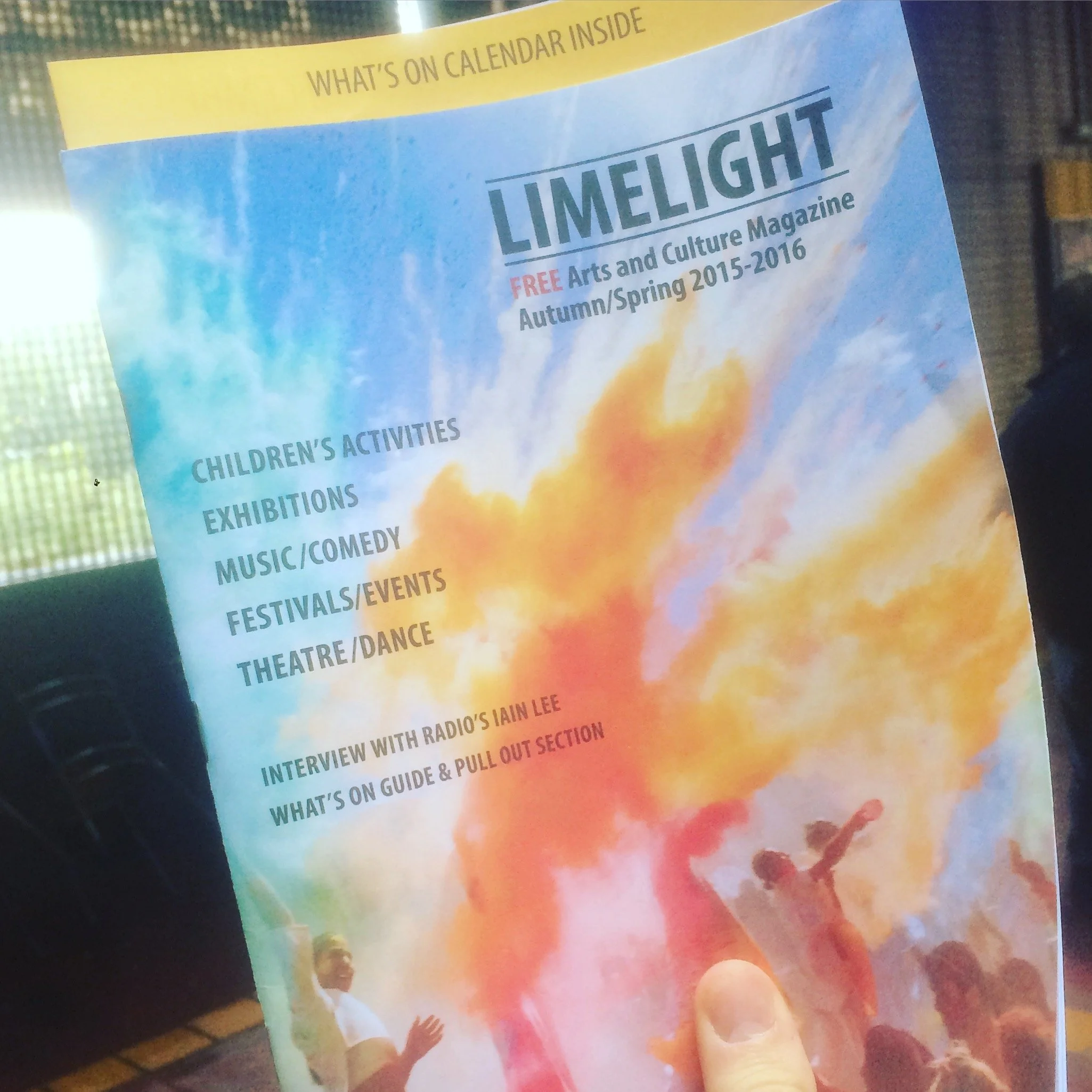 Colorful magazine cover for Limelight Arts and Culture Magazine, Autumn/Spring 2015-2016, with smoke or powder in yellow, orange, and blue and silhouettes of people celebrating.