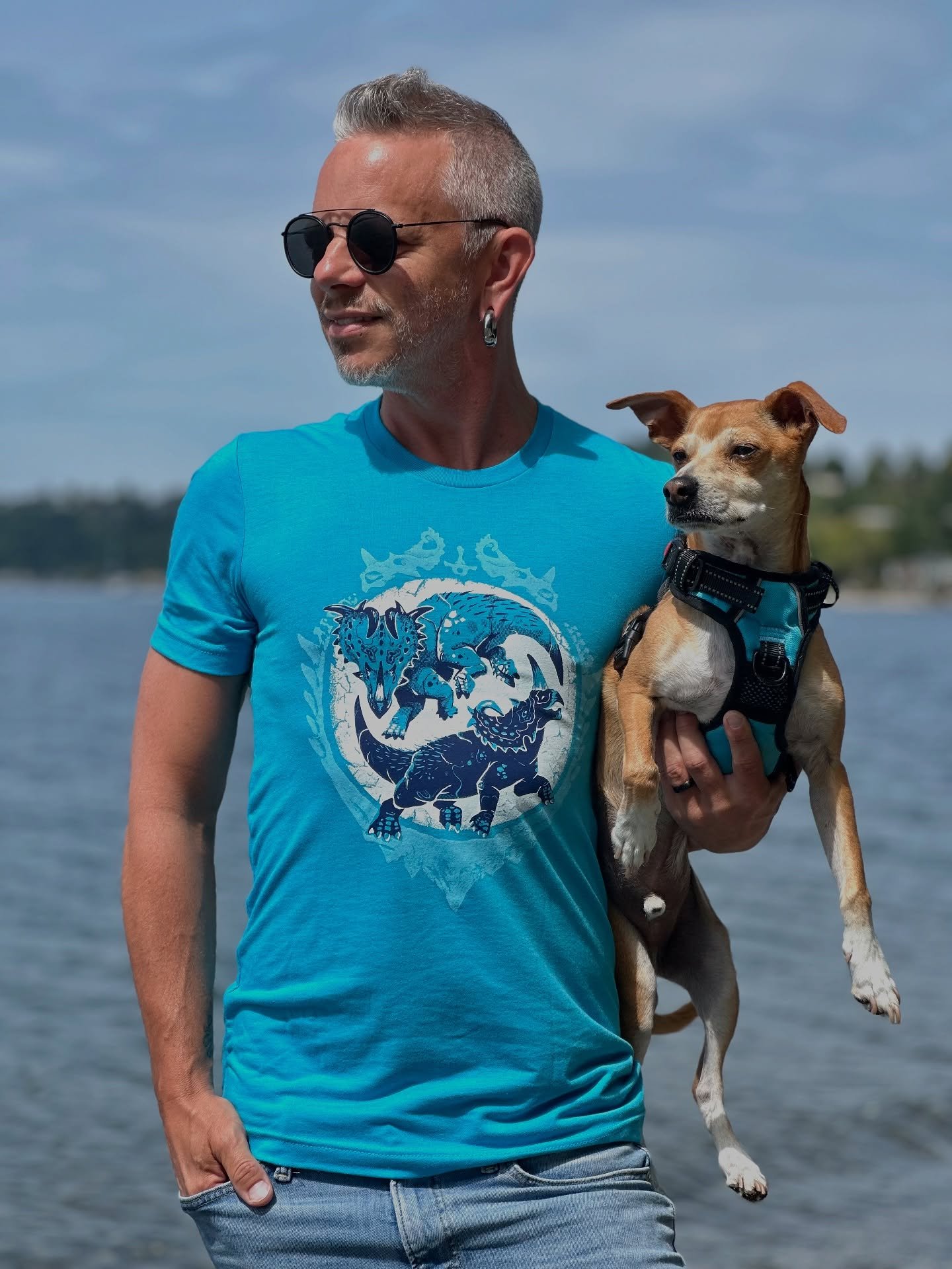 My new dinosaur shirts turned out amazing, thanks to the talented crew at @inkknifepress. I&rsquo;m grateful to our good friend @starrkydd for modeling on a sunny spring afternoon. 

If you want one of these you can pick one up at @whitecenterpride o