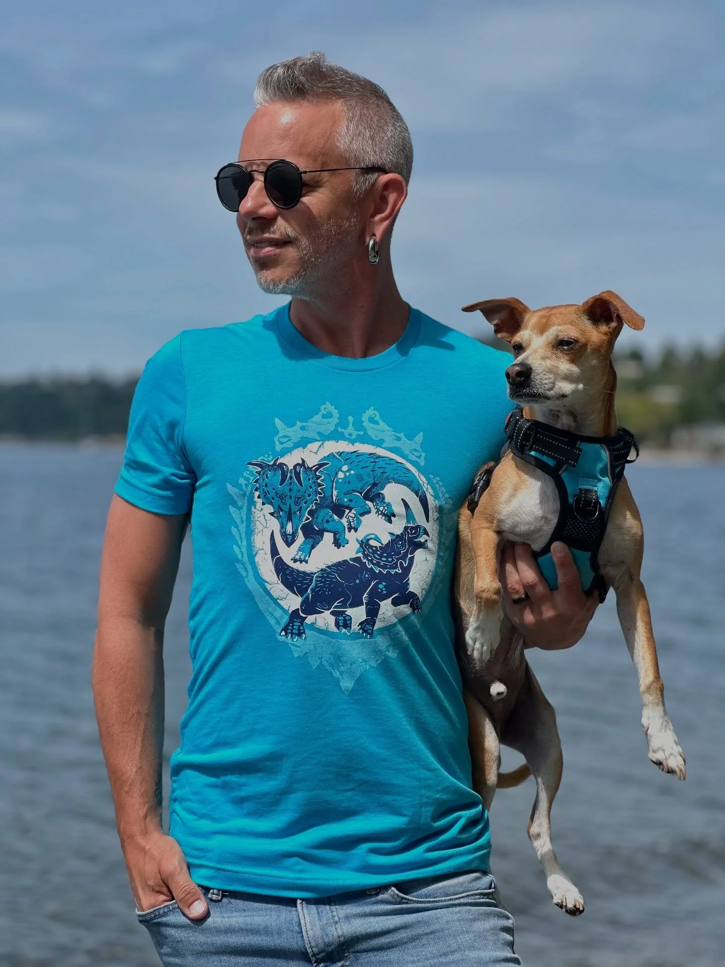 My new dinosaur shirts turned out amazing, thanks to the talented crew at @inkknifepress. I&rsquo;m grateful to our good friend @starrkydd for modeling on a sunny spring afternoon. 

If you want one of these you can pick one up at @whitecenterpride o