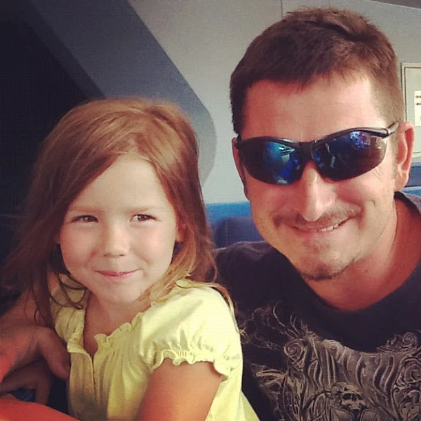 May 2012: KOA/SheCon trip - People Mover Time for the hubs and Ali at Disney World