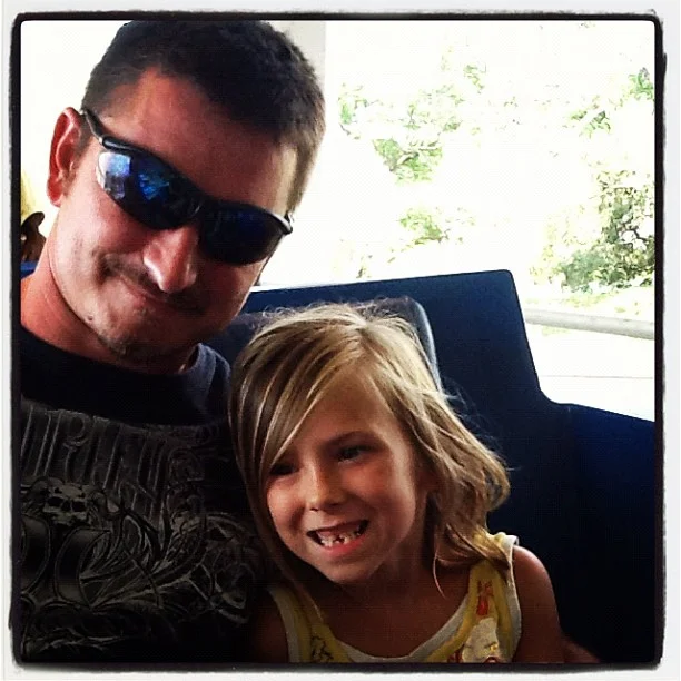 May 2012: KOA/SheCon trip - Ema & the Hubs on the People Mover at Disney World