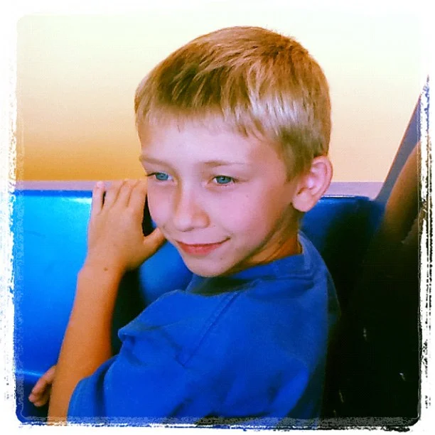 May 2012: KOA/SheCon trip - Matt on the People Mover at Disney World