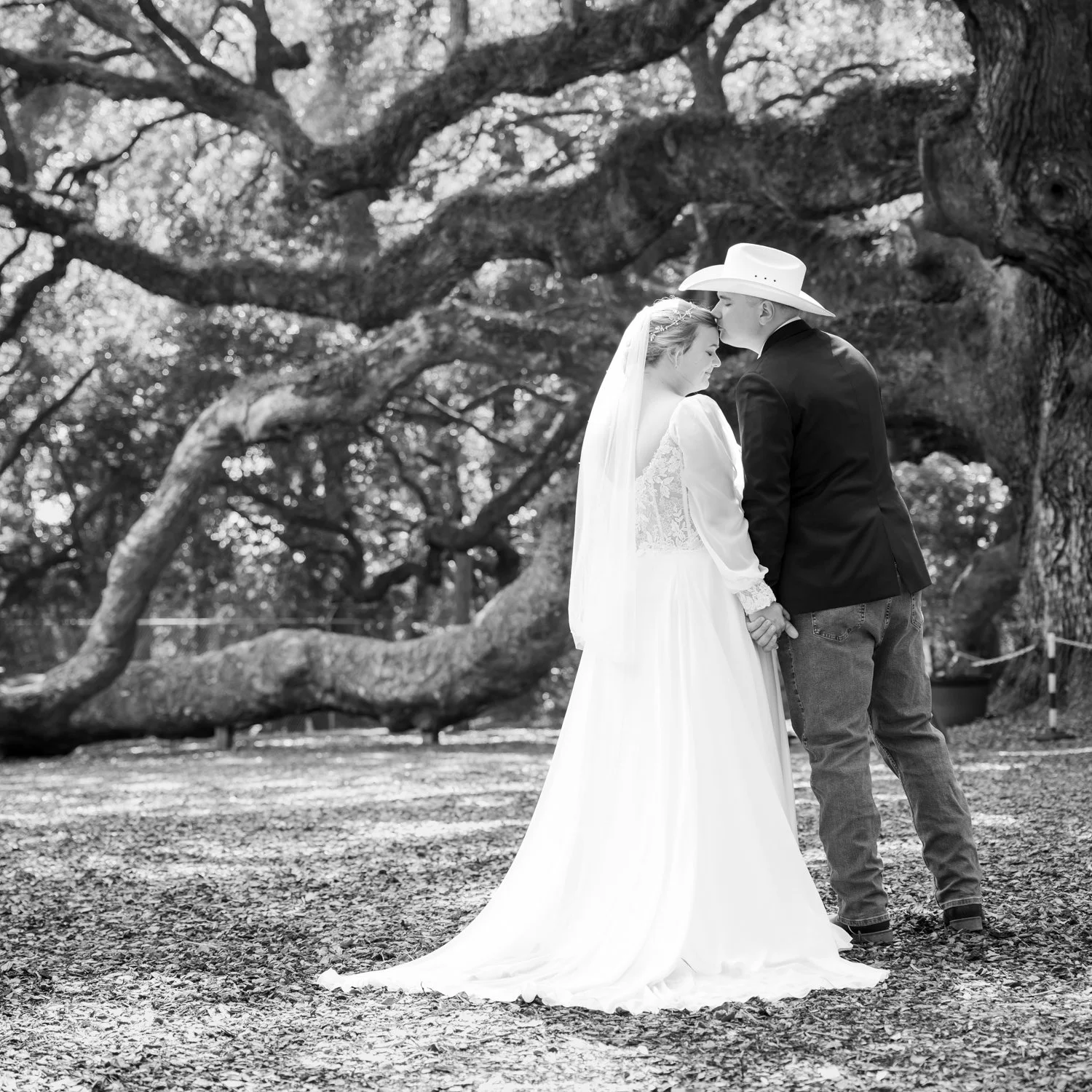 bride and groom forehead kiss at angel oak