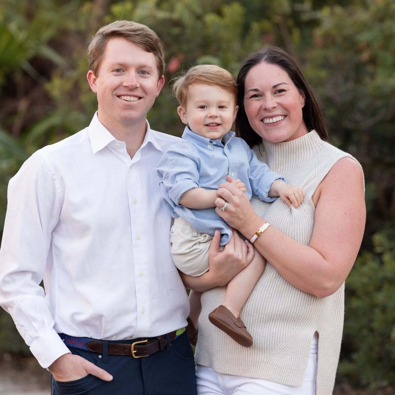 portrait of mom, dad and son