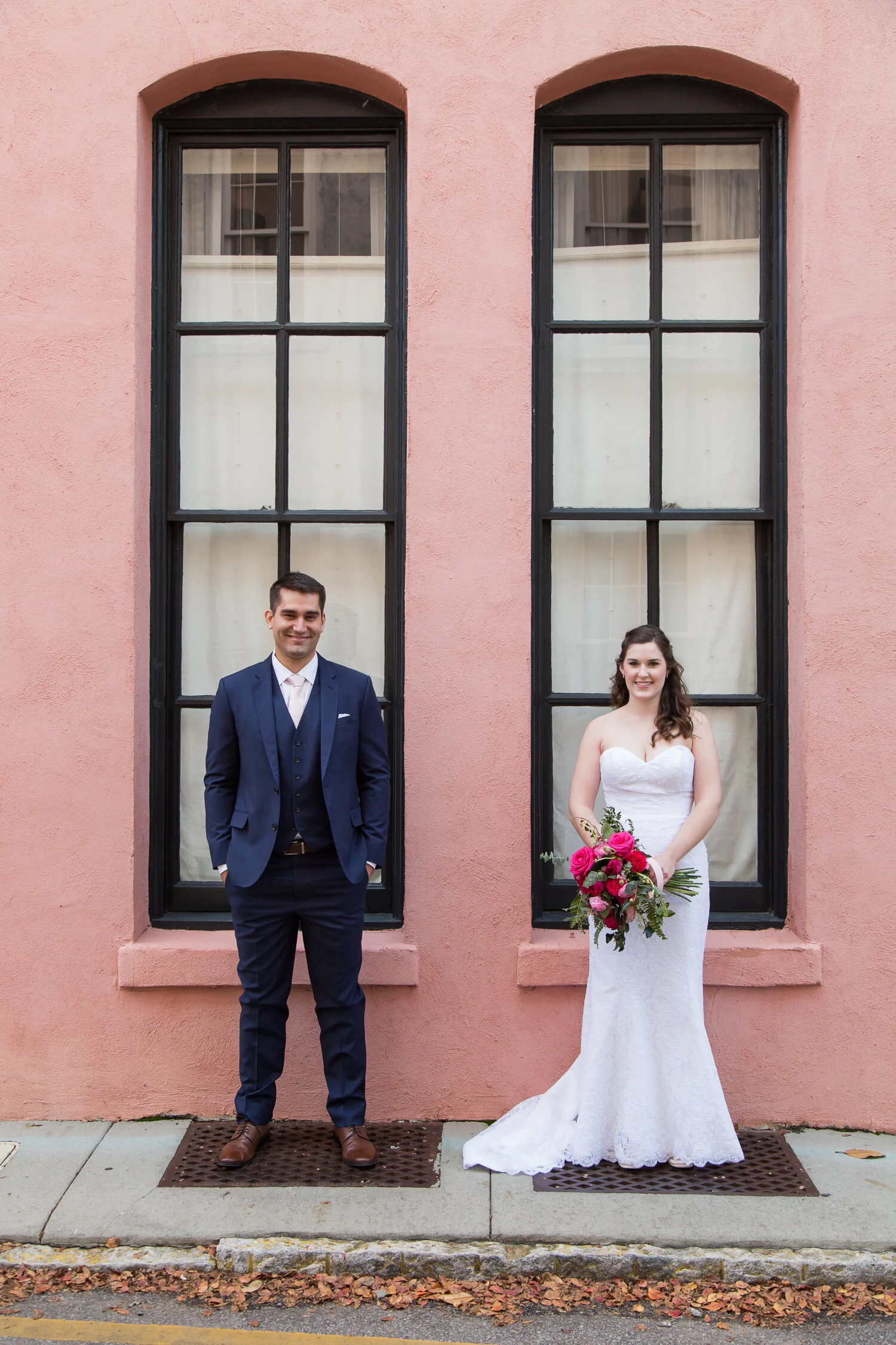 eloped couple in Rainbow Row of Charleston