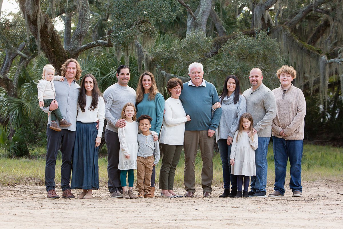extended family portrait in a green space