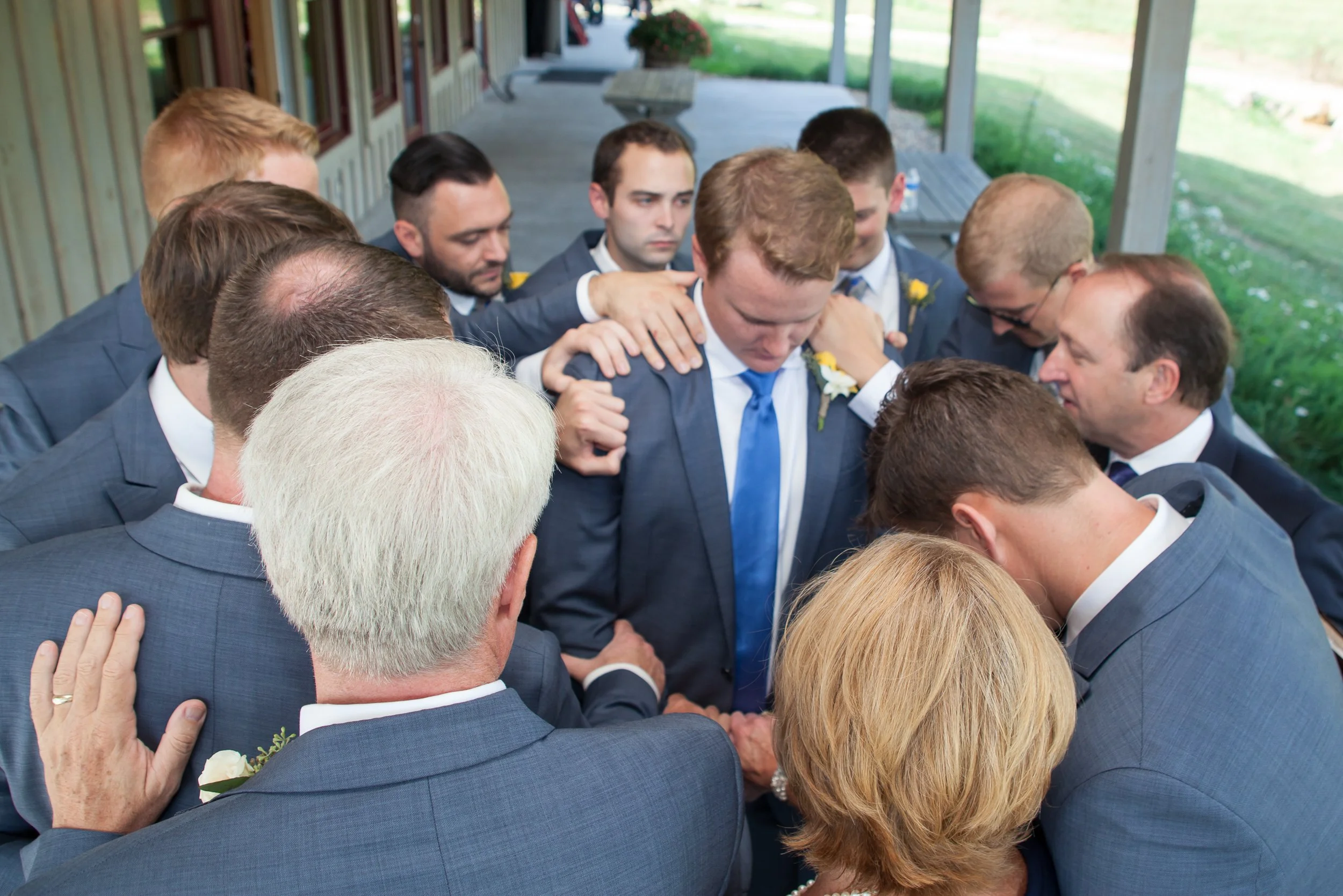 groom-groomsmen-prayer.jpg