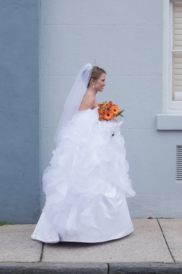 charleston-bride-with-orange-bouquet.jpg