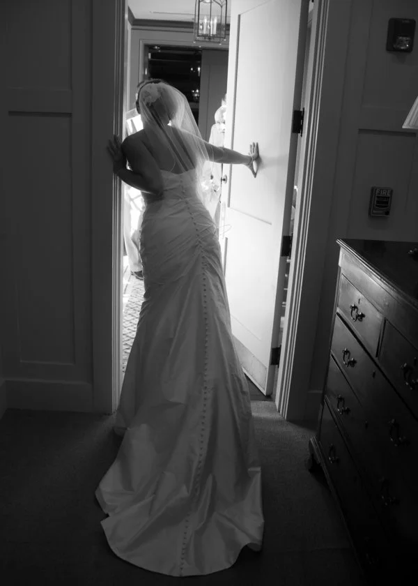black-white-bride-opening-door.jpg