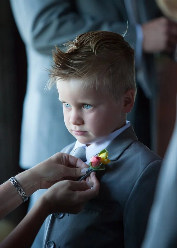 ring-bearer-getting-pinned.jpg